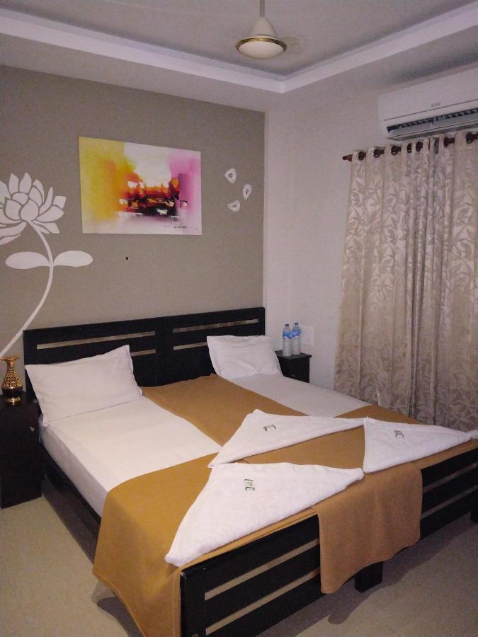 Hotel Metro Residency à Kochi Extérieur photo